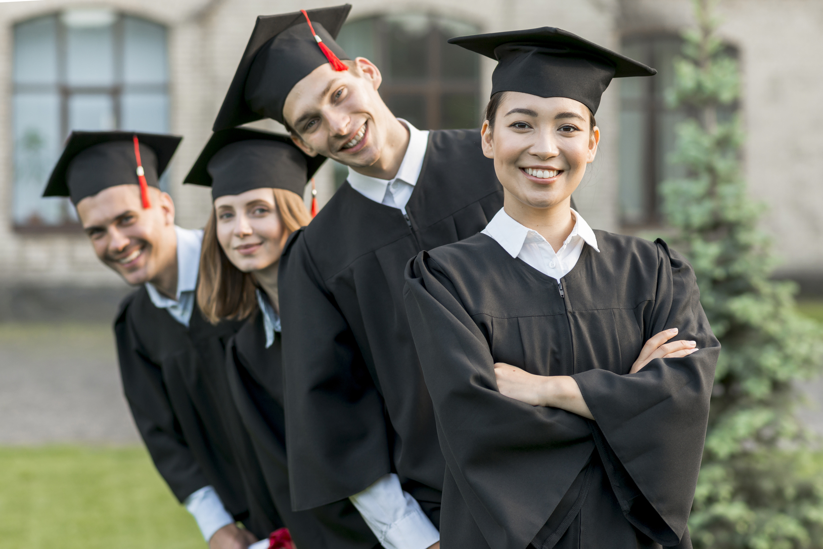 portrait-group-students-celebrating-their-graduation